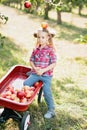 Girl with Apple in the Apple Orchard