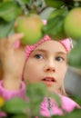 The girl and an apple-tree Royalty Free Stock Photo