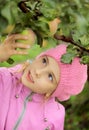 The girl and an apple-tree Royalty Free Stock Photo