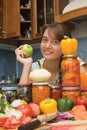 Girl with apple and vegetables Royalty Free Stock Photo