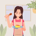 Girl with apron is cooking, Holding plate with omelet topped ketchup in the Kitchen, ingredients chef cooking, Homemade food, dinn