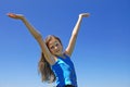 Girl with arms standing on Meadow Royalty Free Stock Photo