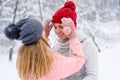 Girl arrange hat of her beloved boyfriend