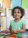 Girl Assembling Puzzles In Classroom Royalty Free Stock Photo
