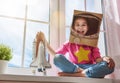 Girl in an astronaut costume Royalty Free Stock Photo