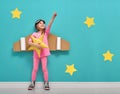 Girl in an astronaut costume Royalty Free Stock Photo