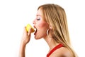 Girl attempts to eat a sour lemon Royalty Free Stock Photo
