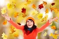 Girl in autumn orange hat with outstretched arm. Royalty Free Stock Photo