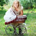 Girl with baby buggy