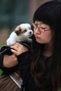 Girl with baby dog