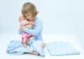 Girl and baby doll Royalty Free Stock Photo