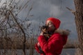 Girl with baby goat on farm outdoors. Village animals. happy child hugs goat, concept of unity of nature and man Royalty Free Stock Photo