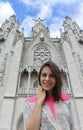 Girl on the background of statue of Christ. Tibidabo