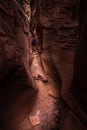 Girl Backpacker exploring Little Wild Horse Canyon Utah Royalty Free Stock Photo