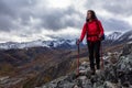 Girl Backpacking along Scenic Hiking Trail