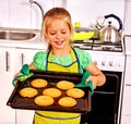 Girl baking cookies in the oven Royalty Free Stock Photo