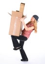 Girl balancing with cardboard boxes