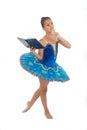Girl ballerina dancing while read book. Ballet career issues. Depriving children ballerina. Most of time child dancer Royalty Free Stock Photo
