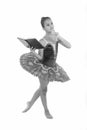 Girl ballerina dancing while read book. Ballet career issues. Depriving children ballerina. Most of time child dancer Royalty Free Stock Photo