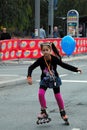 Girl with balloon on race