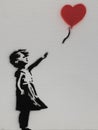 Girl with Balloon, Red Heart, stencil murals by Banksy