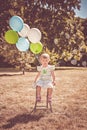 Girl with balloons and bubbles Royalty Free Stock Photo