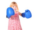 Girl with bared teeth and boxers gloves Royalty Free Stock Photo
