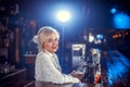 Girl barman makes a cocktail on the alehouse