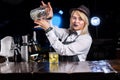 Girl barman makes a cocktail in the public house Royalty Free Stock Photo