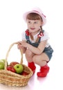 Girl with basket of apples Royalty Free Stock Photo