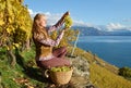 Girl with a basket full of grapes Royalty Free Stock Photo