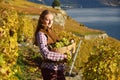 Girl with a basket full of grapes Royalty Free Stock Photo