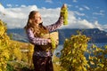 Girl with a basket full of grapes Royalty Free Stock Photo