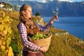 Girl with a basket full of grapes Royalty Free Stock Photo