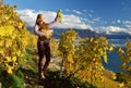 Girl with a basket full of grapes. Royalty Free Stock Photo