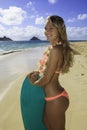 Girl on the beach with boogie board Royalty Free Stock Photo