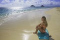 Girl on the beach with boogie board Royalty Free Stock Photo