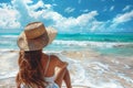 girl on the beach enjoying sunshine on summer vacation. Royalty Free Stock Photo