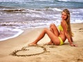 Girl on beach near the sea. Royalty Free Stock Photo