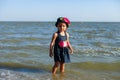 Girl on the beach by the sea