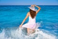 Girl in beach sea shore with waves splash Royalty Free Stock Photo