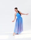 girl beautiful dress is engaged in dancing in the studio Royalty Free Stock Photo