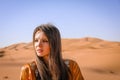 A girl in a beautiful Moroccan dress. Merzouga Morocco Royalty Free Stock Photo