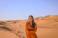 A girl in a beautiful Moroccan dress. Merzouga Morocco Royalty Free Stock Photo