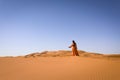 A girl in a beautiful Moroccan dress. Merzouga Morocco Royalty Free Stock Photo