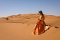 A girl in a beautiful Moroccan dress. Merzouga Morocco Royalty Free Stock Photo