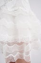 White wedding dress with ruffles.