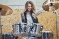 Girl behind drums in a professional recording studio Royalty Free Stock Photo