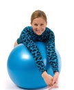 Girl behind gym ball Royalty Free Stock Photo