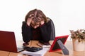 Girl behind office desk grabbed head in his hands Royalty Free Stock Photo